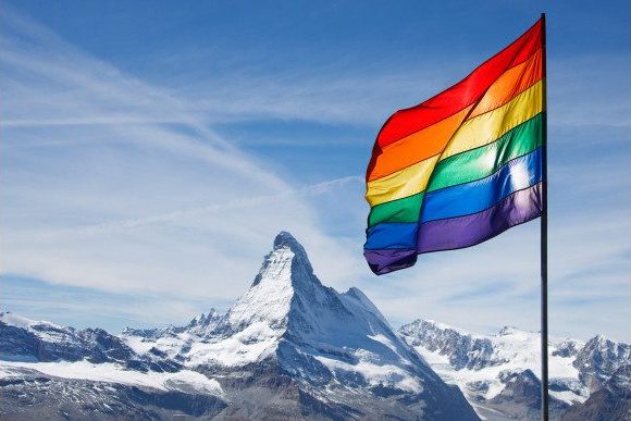 rainbow flag in Swiss mountain