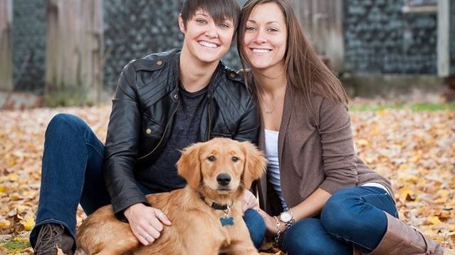 lesbian couple with pet