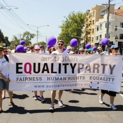 Australian-Equality-Party-holding banner during a march-lotl