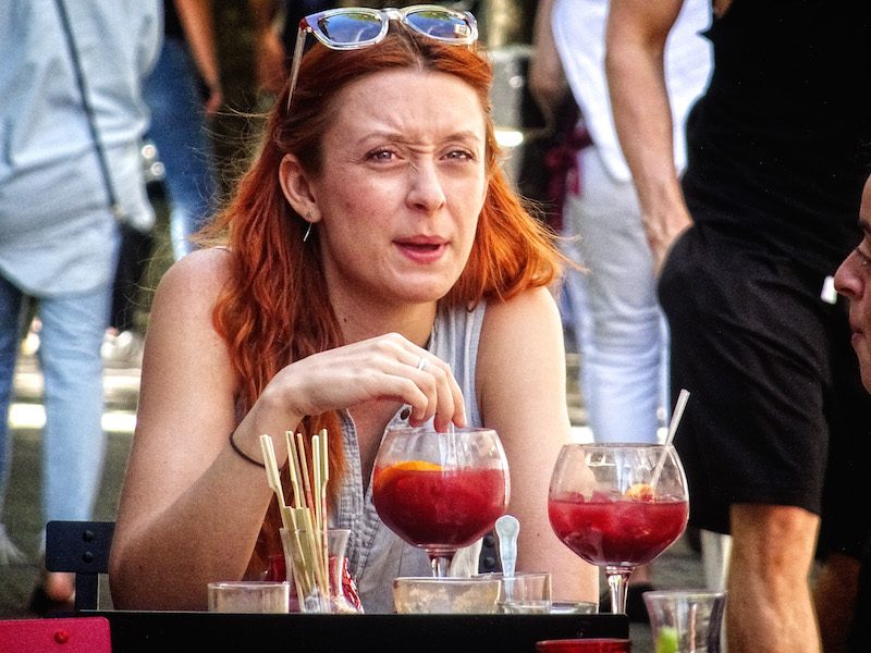Woman enjoys a cocktail