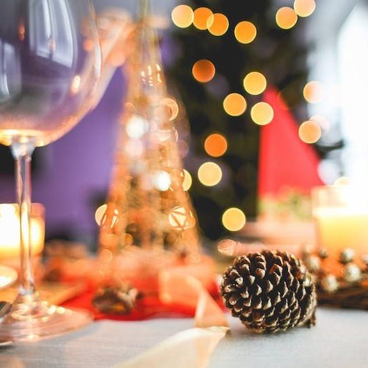 wine glass on christmas decorated table