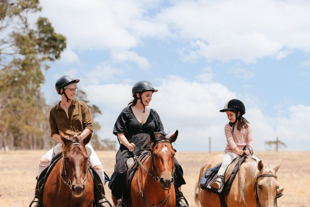 Jesse Stoelwinder + Em Williams with their daughter