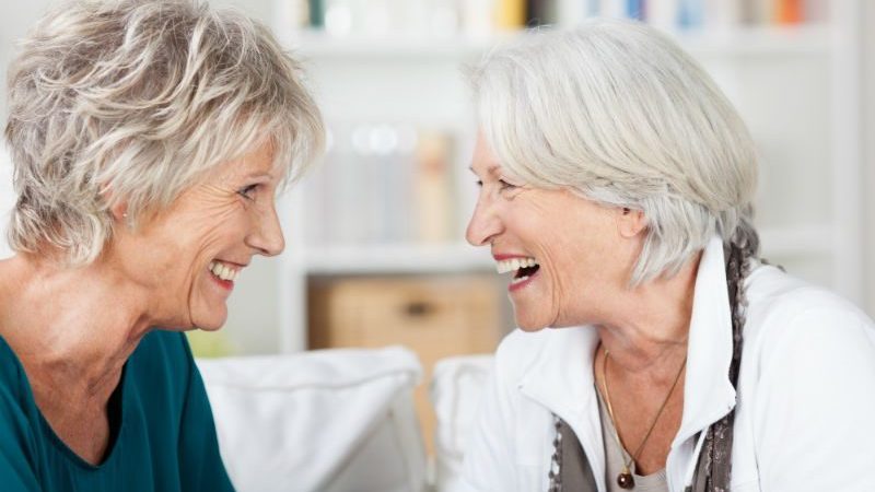 2 older women laughing