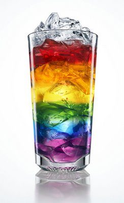 glass filled with rainbow colours