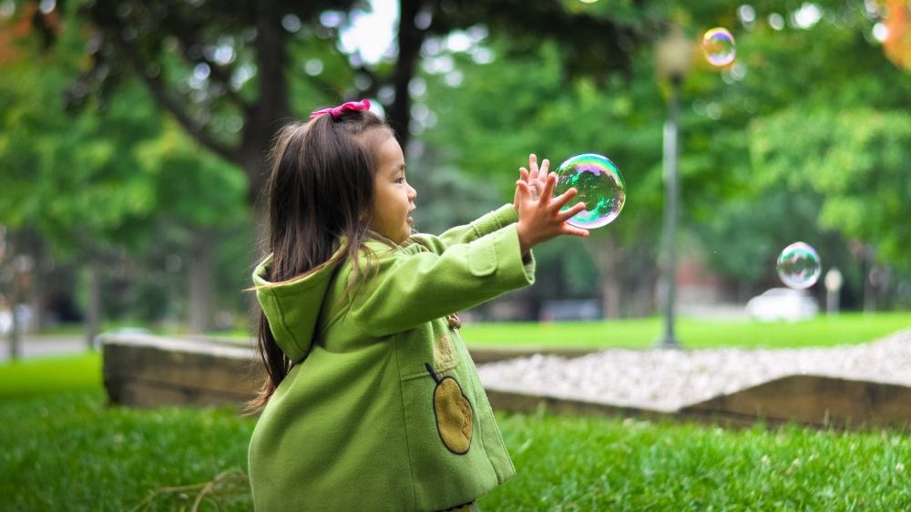 small child playing outside