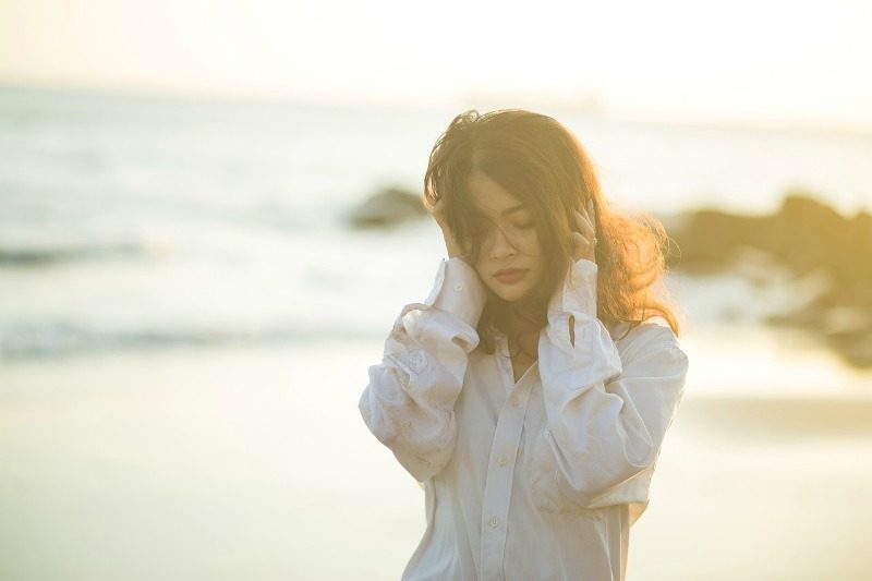 sad woman on beach