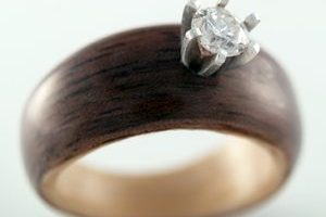 Walnut and Maple engagement ring with salvaged diamond setting