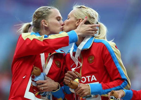 Russian Athletes Kiss