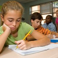 younggirl_atschool_writing_pencil