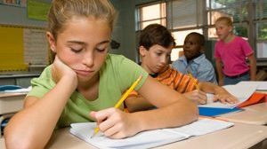 younggirl_atschool_writing_pencil