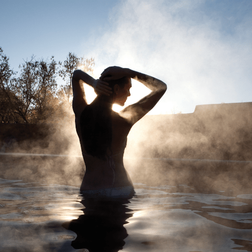 woman in hot spring in Taos