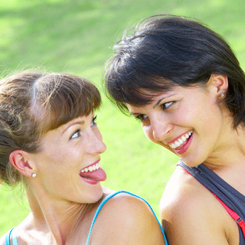 2 women laughing