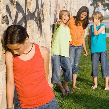 School children teasing a child