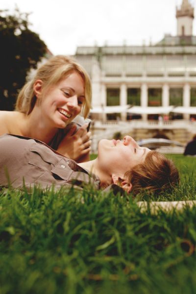 2 women lying on grass in Vienna 