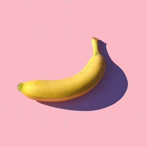 Banana with pink background