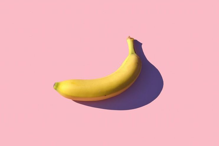 Banana with pink background