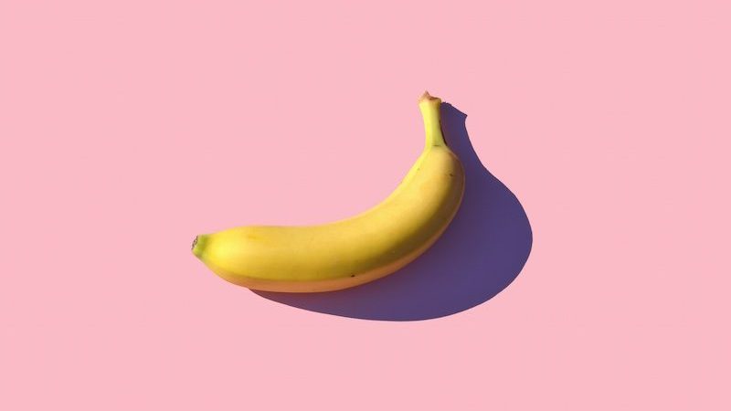 Banana with pink background