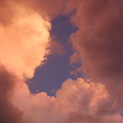 Blue Sky opens up through dark clouds