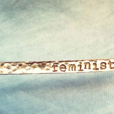 Braclet with writing 'feminist'