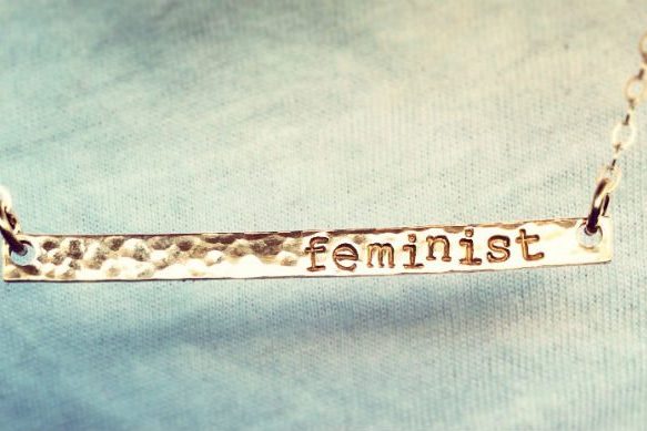 Braclet with writing 'feminist'