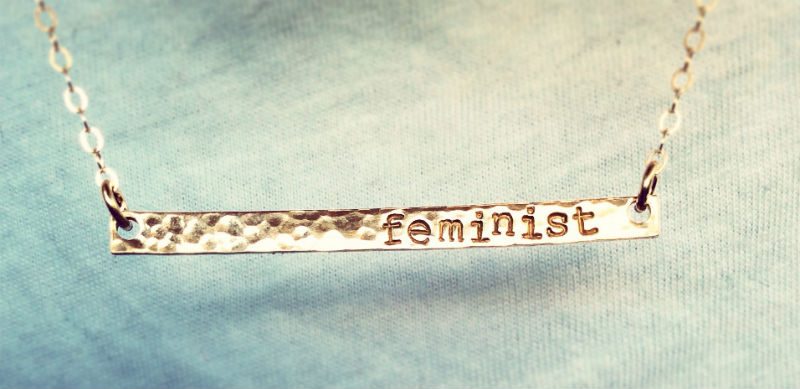 Braclet with writing 'feminist'