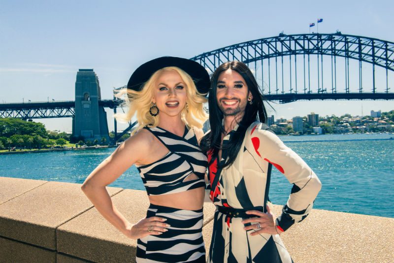 Conchita Wurst and Courtney Act posing infront of Sydney Harbour Bridge