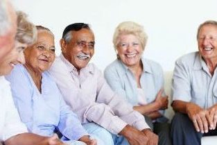 Group of seniors sitting and laughing