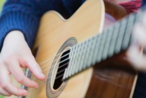 Person playing the classic guitar