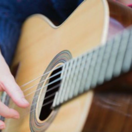 Person playing the classic guitar