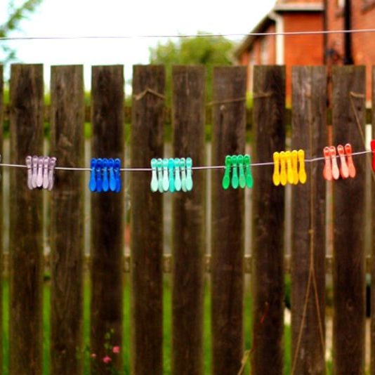 Rainbow Coloured Pegs on washing line