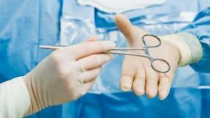 Surgeon passes scissor