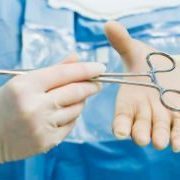 Surgeon passes scissor