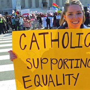 Woman holds Marriage Equality for Catholics sign
