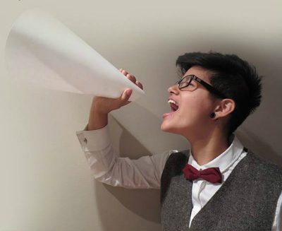 Woman screaming through megaphone