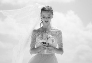 bride holding flowers