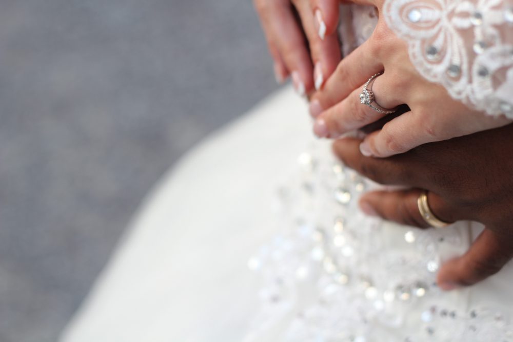 hands of 2 brides