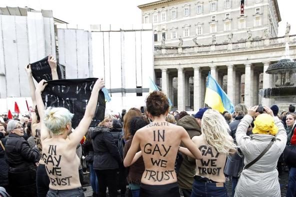 Topless protesters criticise Vatican