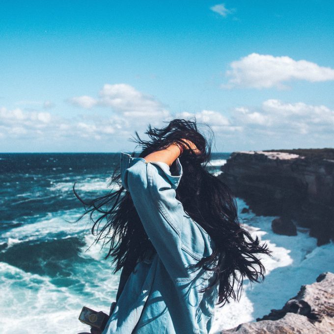 woman looking out to the ocean