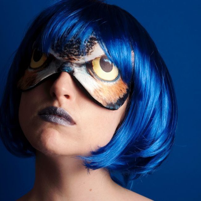woman with blue hair and mask